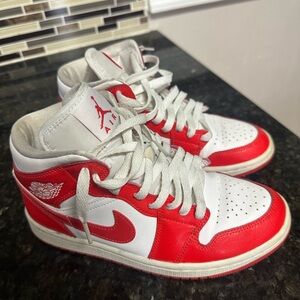 Air Jordan Sneakers with Red Accents